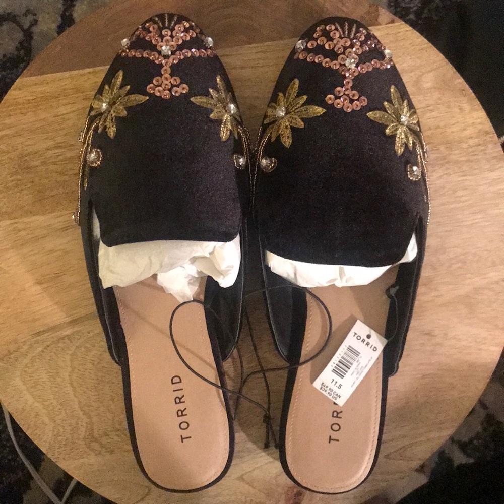 Black, jeweled mules.